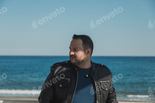 Preview: Man Having A Sunny Day On The Coastline