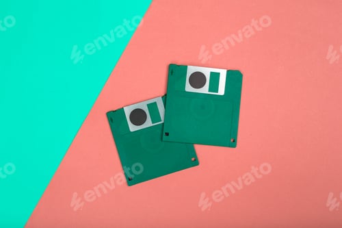 Preview: Old floppy disks on bright surface with contrasting colors