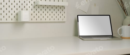 Preview: Home office with mock up laptop, stationery, books, and decoration on white desk