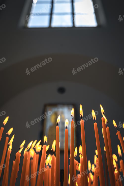 Preview: Close-up, candles in the temple on a blurred background.