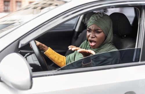 Preview: Angry Black Islamic Woman Driving Car, Arguing With Someone In Traffic Jam