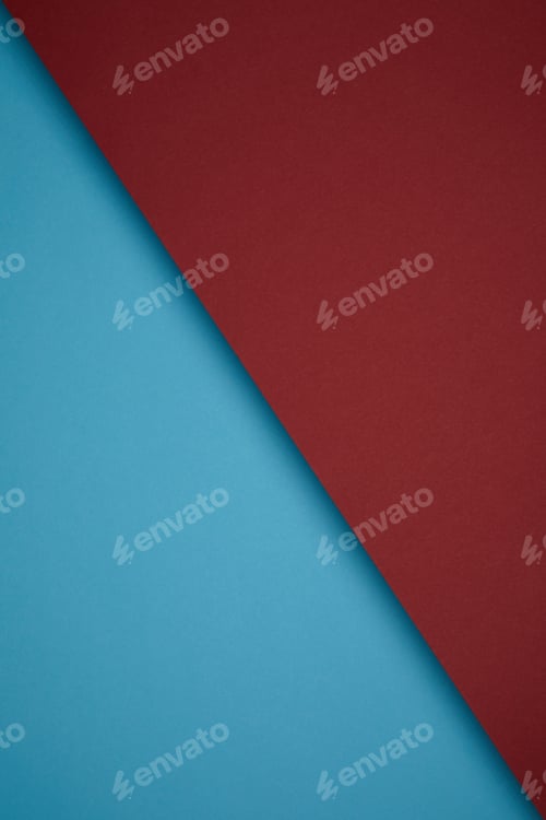 Preview: close up view of creative geometric background from red and blue colored paper