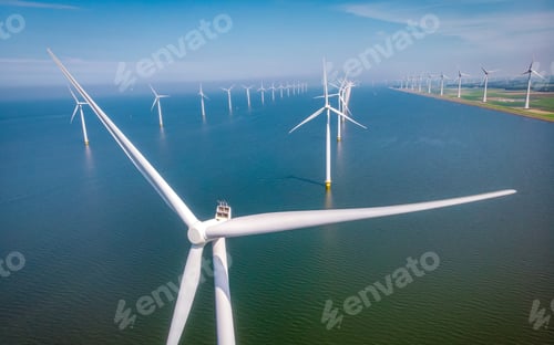 Preview: offshore windmill park with clouds and a blue sky