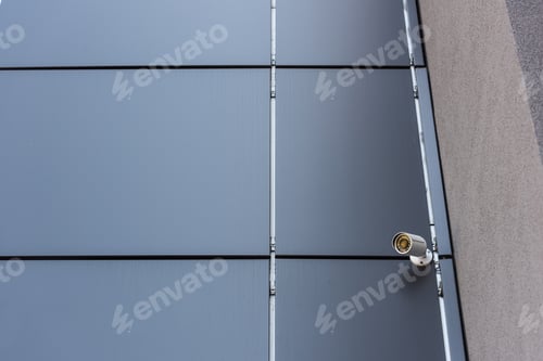 Preview: security camera on wall of office building, security system concept