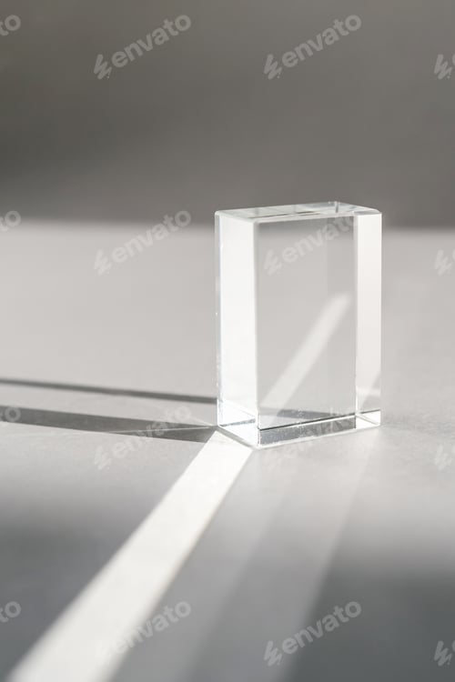 Preview: Transparent crystal prism on a white background.