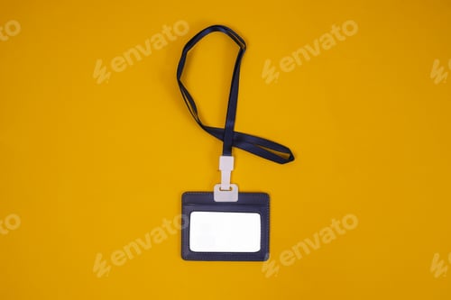 Preview: Flat Lay Of Blank White ID Card Badge Holder With Black Lanyard Isolated Yellow Background
