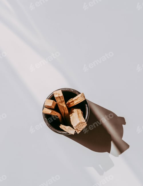 Preview: Wooden sticks Palo Santo in black box on light background
