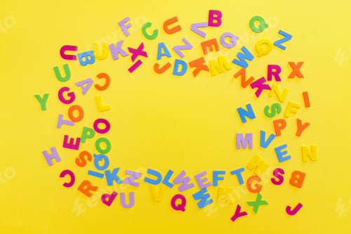 Preview: Back to school concept. Detailed plastic letters on yellow background