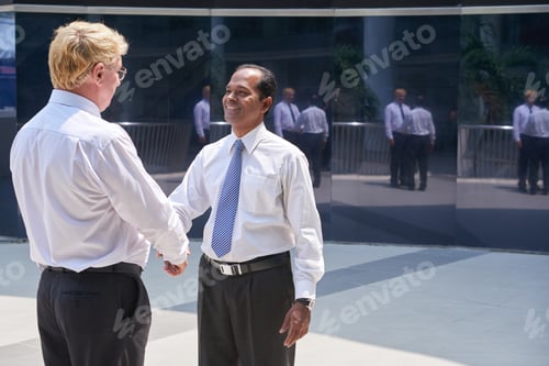 Preview: Businessman Greeting Business Partner