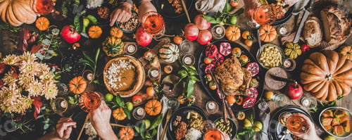 Preview: Family or friends celebrating Thanksgiving day with rose wine