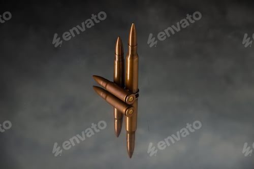 Preview: brown bullets on dark surface shooting gun tank death war
