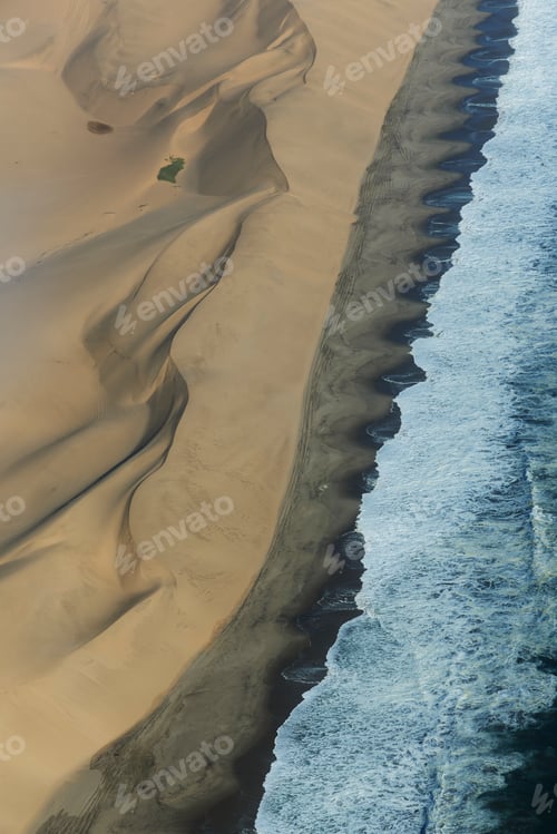 Preview: Aerial view of coastline and dunes, Namib Desert, Namibia