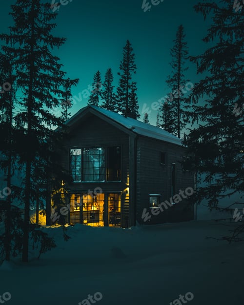 Preview: Picturesque winter scene featuring a wooden cabin nestled amongst evergreen trees.