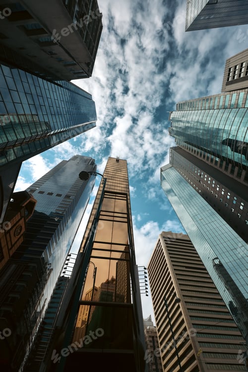 Preview: Skyward view of towering high-rise buildings in the bustling center of Hong Kong