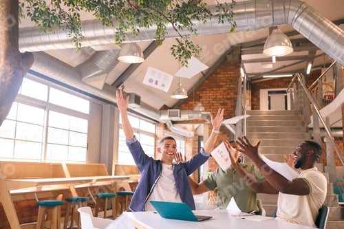 Preview: Businessmen Meeting In Modern Office Sitting Around Table Celebrating Throwing Documents In The Air