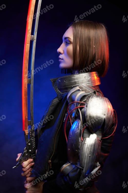Preview: Profile of a martial and futuristic woman looking at glowing sword
