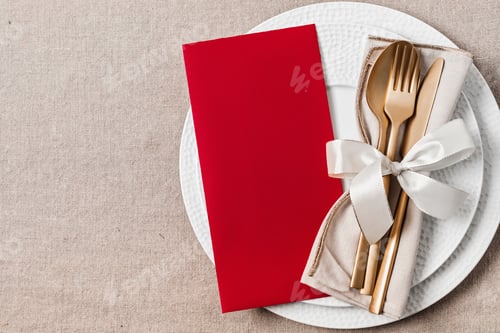 Preview: Festive christmas, wedding, birthday table setting with golden cutlery and porcelain plate