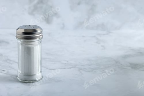 Preview: Salt shaker on marble countertop