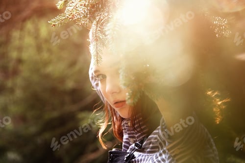 Preview: ↟ Cute charming girl in the summer in the forest in the glare of sunlight