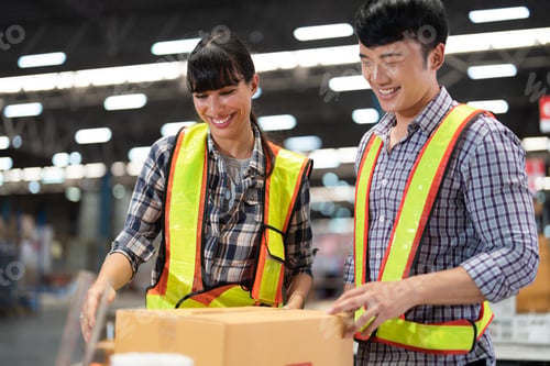Preview: 2 staff worker working in the large depot storage warehouse