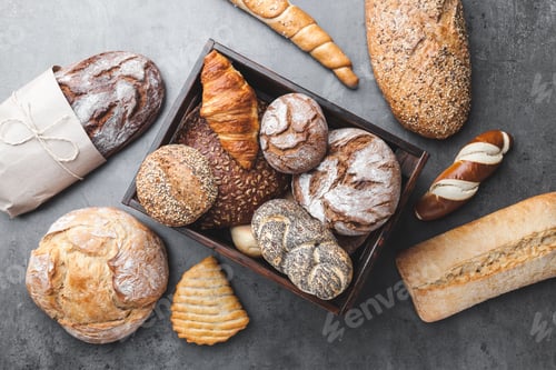 Preview: A basket full of delicious fresh bread on wooden background