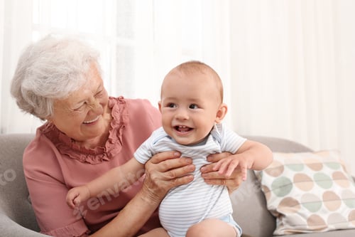 Preview: Happy grandmother with little baby at home