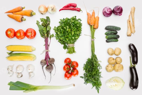 Preview: flat lay with fresh autumn vegetables arranged isolated on white