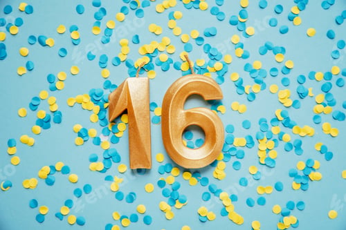Preview: Number 16 sixteen golden celebration birthday candle on yellow and blue confetti Background.