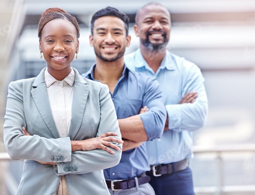 Preview: Shot of a group of businesspeople standing with their arms crossed against a city background