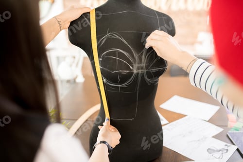 Preview: Female Tailors Working in Atelier Workshop
