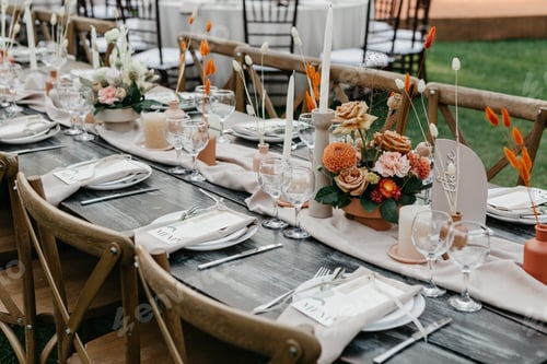 Preview: Wedding decor for guests at banquet, dried flowers, floristry and candles, boho style, service for