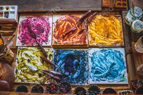 Preview: Colorful Abstract Paint Tiles on Wooden Table