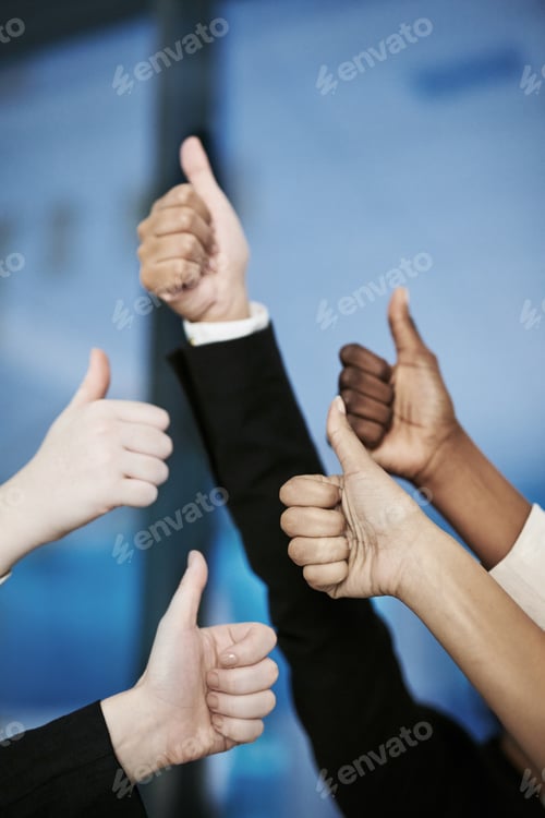 Preview: Great job. Shot of a group of hands showing thumbs up.