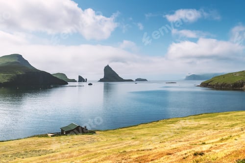 Preview: Dramatic view on Drangarnir and Tindholmur sea stacks