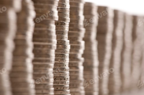 Preview: Close-up stacks of 2 Euros Coins in front of white background