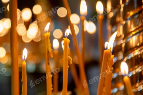 Preview: Candles in the dark with bokeh background, soft focus. Memorial, Remembrance Day, hope.