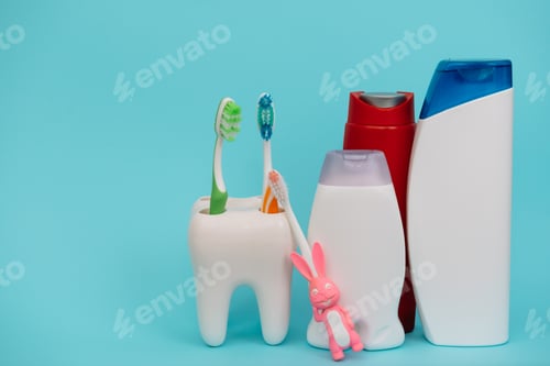 Preview: Shower accessories on a colored background. bathroom setting on blue background.