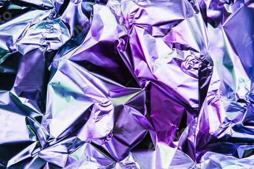 Preview: Crumpled colorful foil background. Abstract pattern. Neon pink and blue colors.