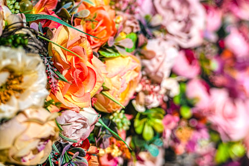 Preview: Colorful of artificial flowers for decoration on wedding ceremony. Selective focus.