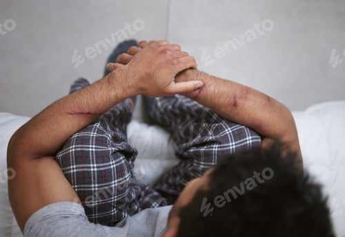 Preview: You look at me and cry everything hurts. Shot of a unrecognizable man sitting in a mental asylum.