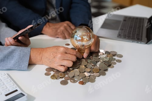 Preview: idea saving energy and accounting finance concept in office.