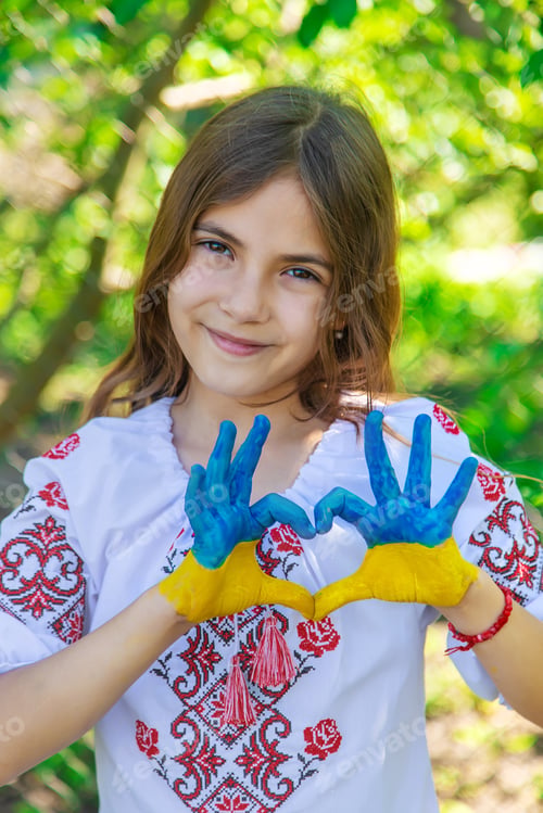 Preview: Child Ukrainian girl in vyshyvanka. Selective focus.