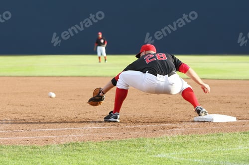 Preview: View of athletes playing baseball in the field