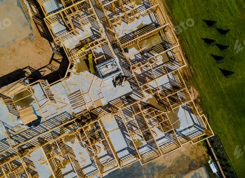 Preview: New home construction framing of a house under construction