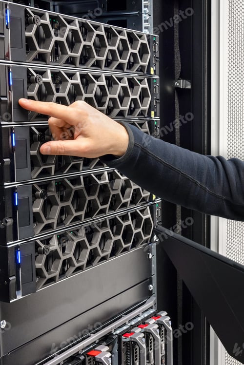 Preview: Male IT Professional With Digital Tablet Examining Virtual Hardware