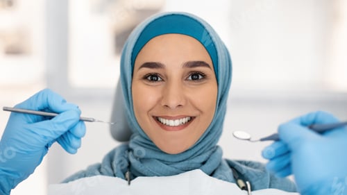 Preview: Cosmetic Dentistry. Smiling Islamic Lady In Hijab Posing During Checkup In Clinic