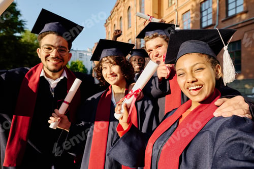 Preview: Happy graduated students making selfie portrait