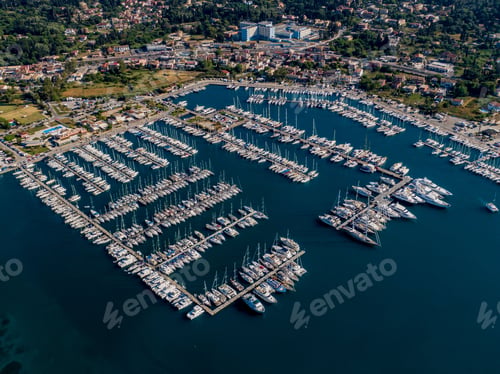 Preview: Aerial view of a bustling marina with yachts and boats.