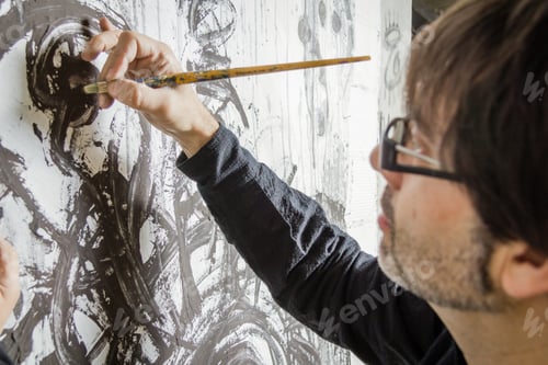 Preview: Painter artist working on a oil canvas