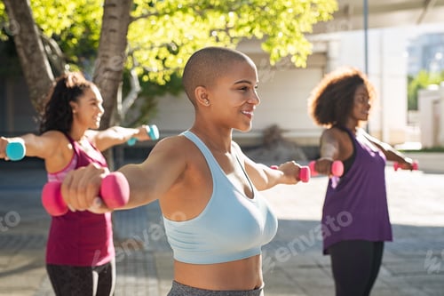 Preview: Three curvy women exercising with dumbbells